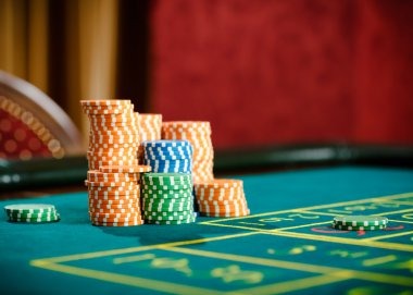 Baccarat table showing Cash Out button during play